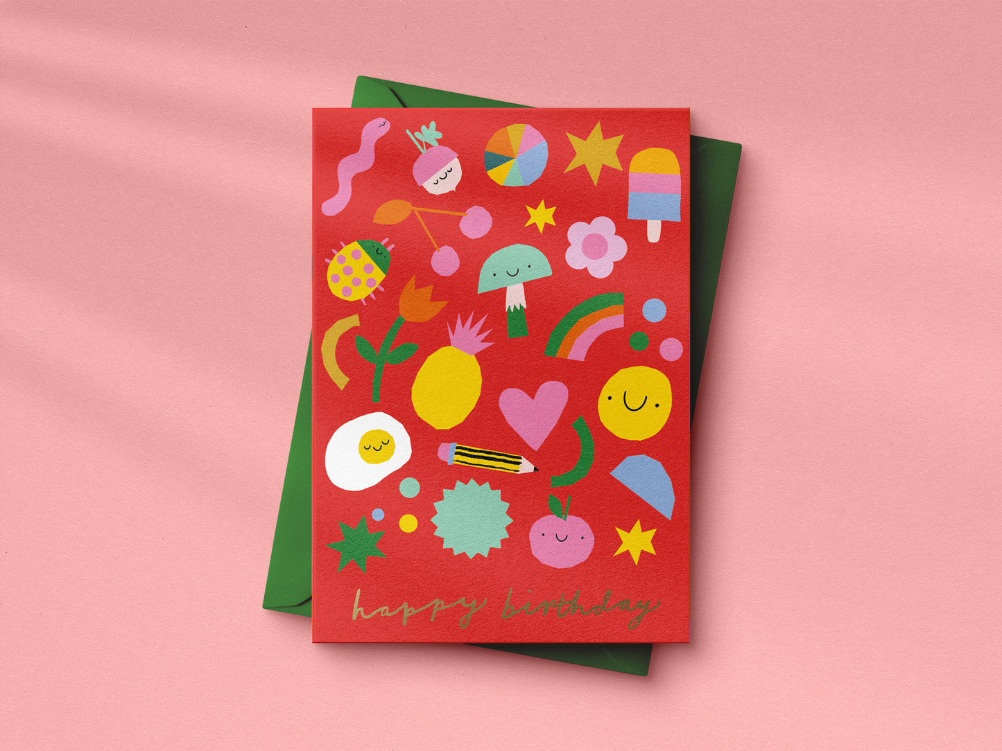 Red birthday card with colorful illustrations on a pink background